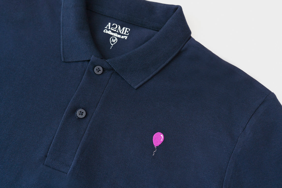 Polo AZUL MARINO globo morado